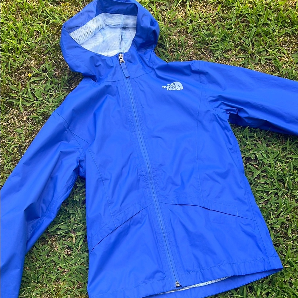 The North Face Blue Raincoat with Hood and Waterproof Design
